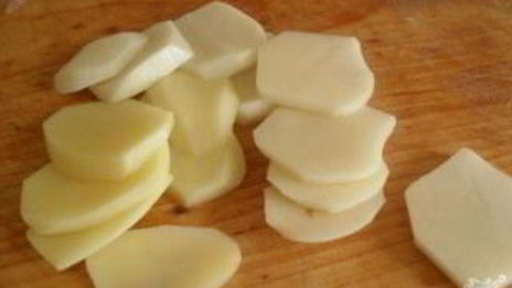 свинина по-французски с помидорами и картошкой