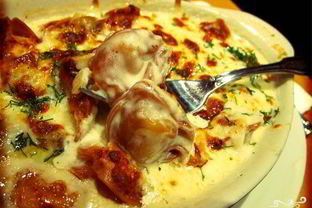 Пельмени в духовке под соусом