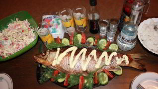 Рыба, запеченная с квашеной капустой