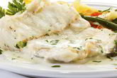 Треска запеченная в сметано-укропном соусе
