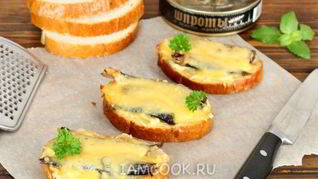 Бутерброды горячие со шпротами